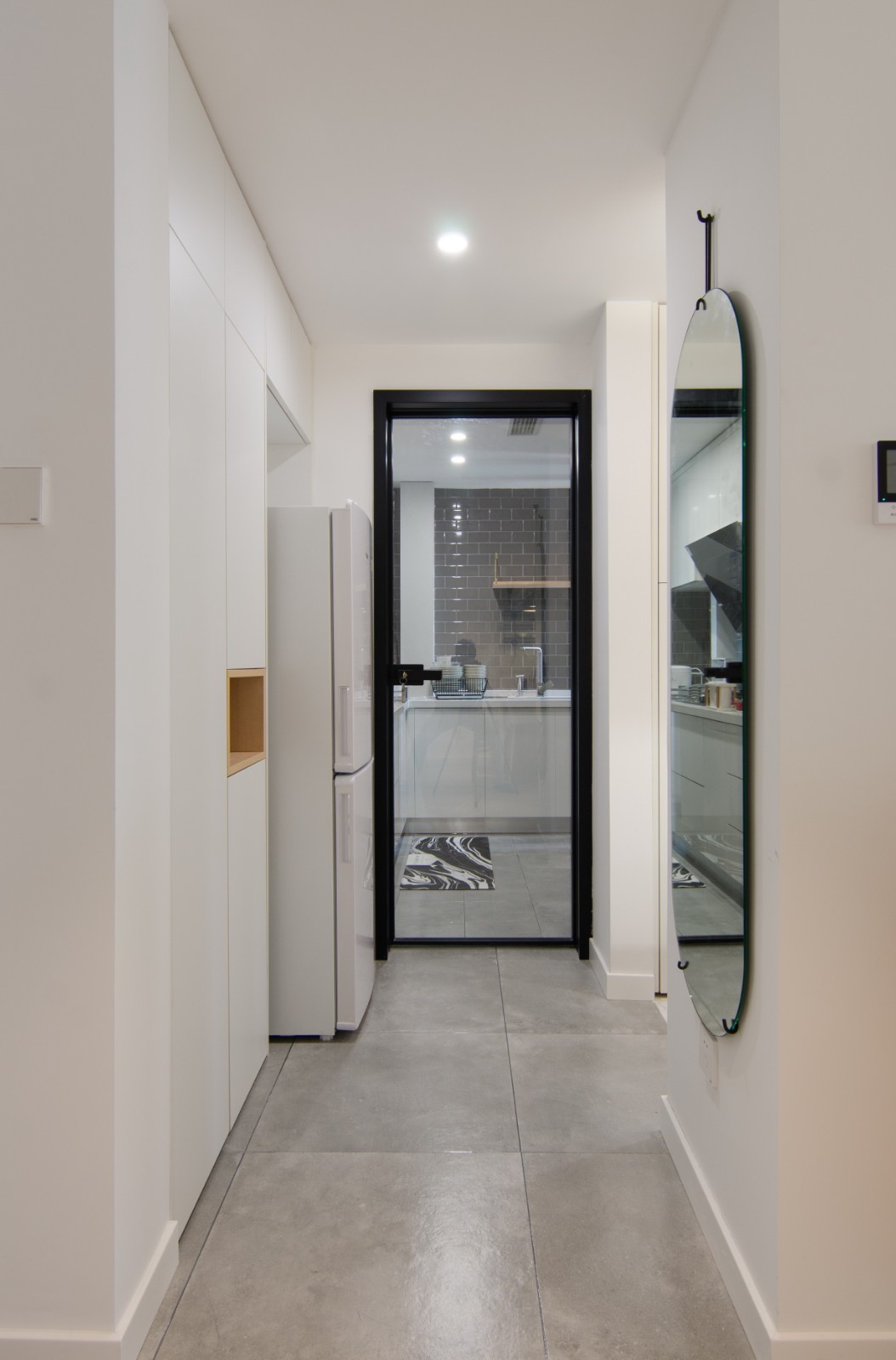 現(xiàn)代簡約風(fēng)格家裝設(shè)計室內(nèi)裝修效果圖-玄關(guān) 現(xiàn)代簡約風(fēng)格家裝設(shè)計室內(nèi)裝修效果圖-玄關(guān)